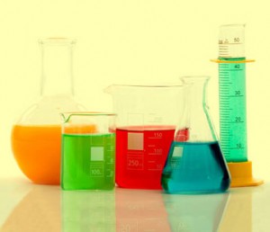 chemistry bottles with liquid inside